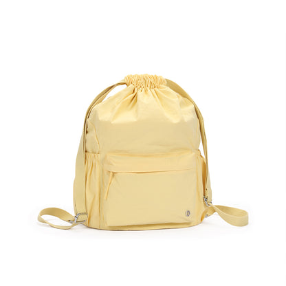 (Durlapue) Stylish and lightweight nylon backpack, solid color drawstring design, can accommodate a 13-inch laptop.